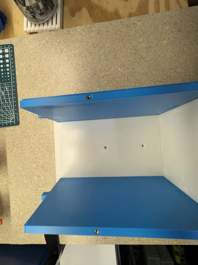 Sides, base, and back slid together on their dovetail joints