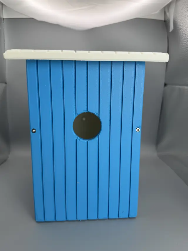 Assembled blue house with the top and front screwed on
