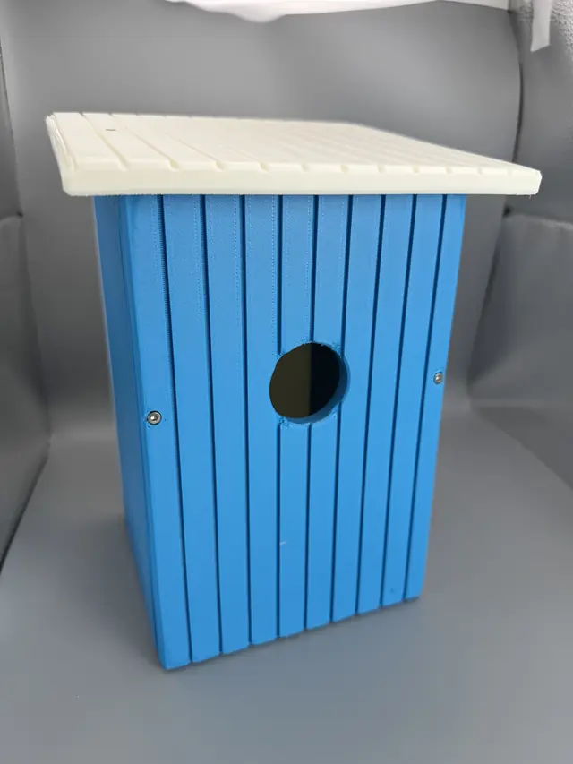Blue bluebird house, portrait view